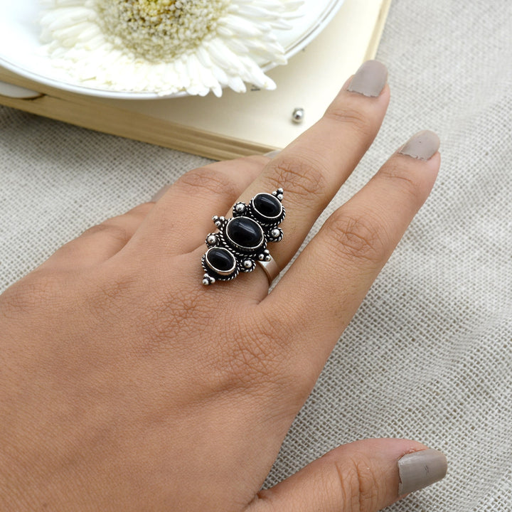 Silver ring with black stone jewellery deals